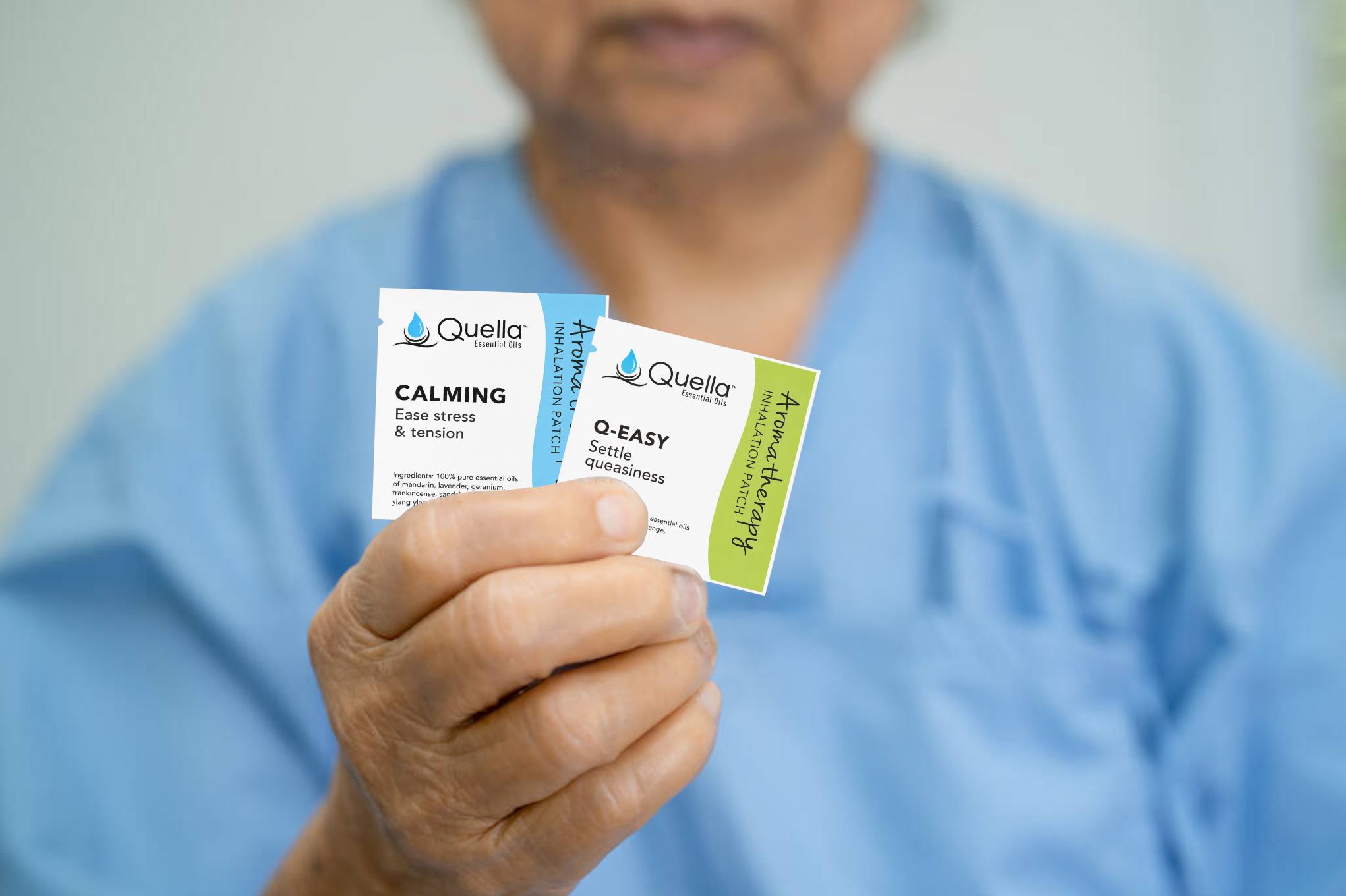 Image of Healthcare provider holding Quella Aromatherapy Patches